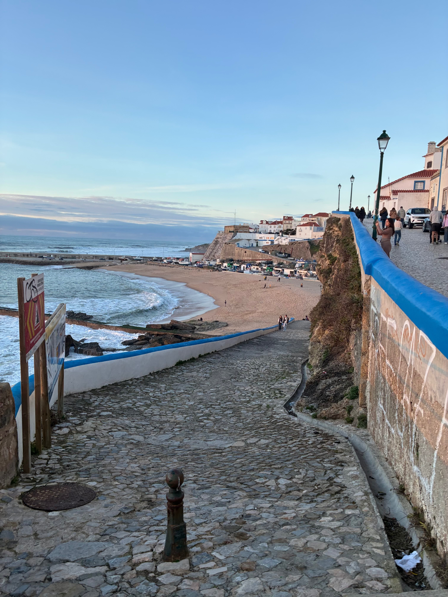 Cobblestone path down to the beach in Ericeira, Portugal